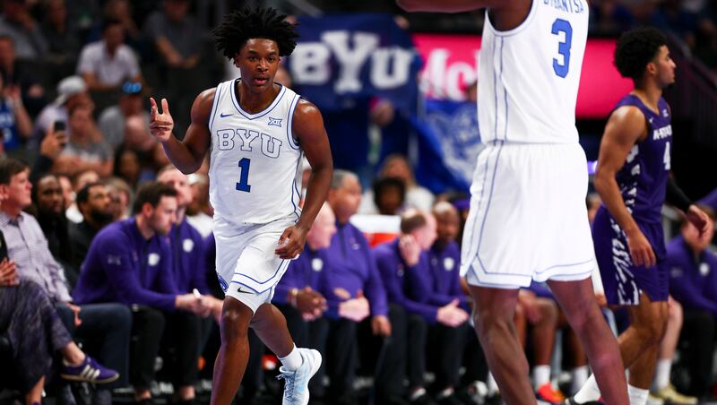 BYU guard Robert Wright III (1) celebrates after making a 3-pointer during the first half of the game against the Kansas State Wildcats during the 2026 Phillips 66 Big 12 Men's Basketball Tournament at the T-Mobile Center in Kansas City, Missouri, on Tuesday, March 10, 2026.