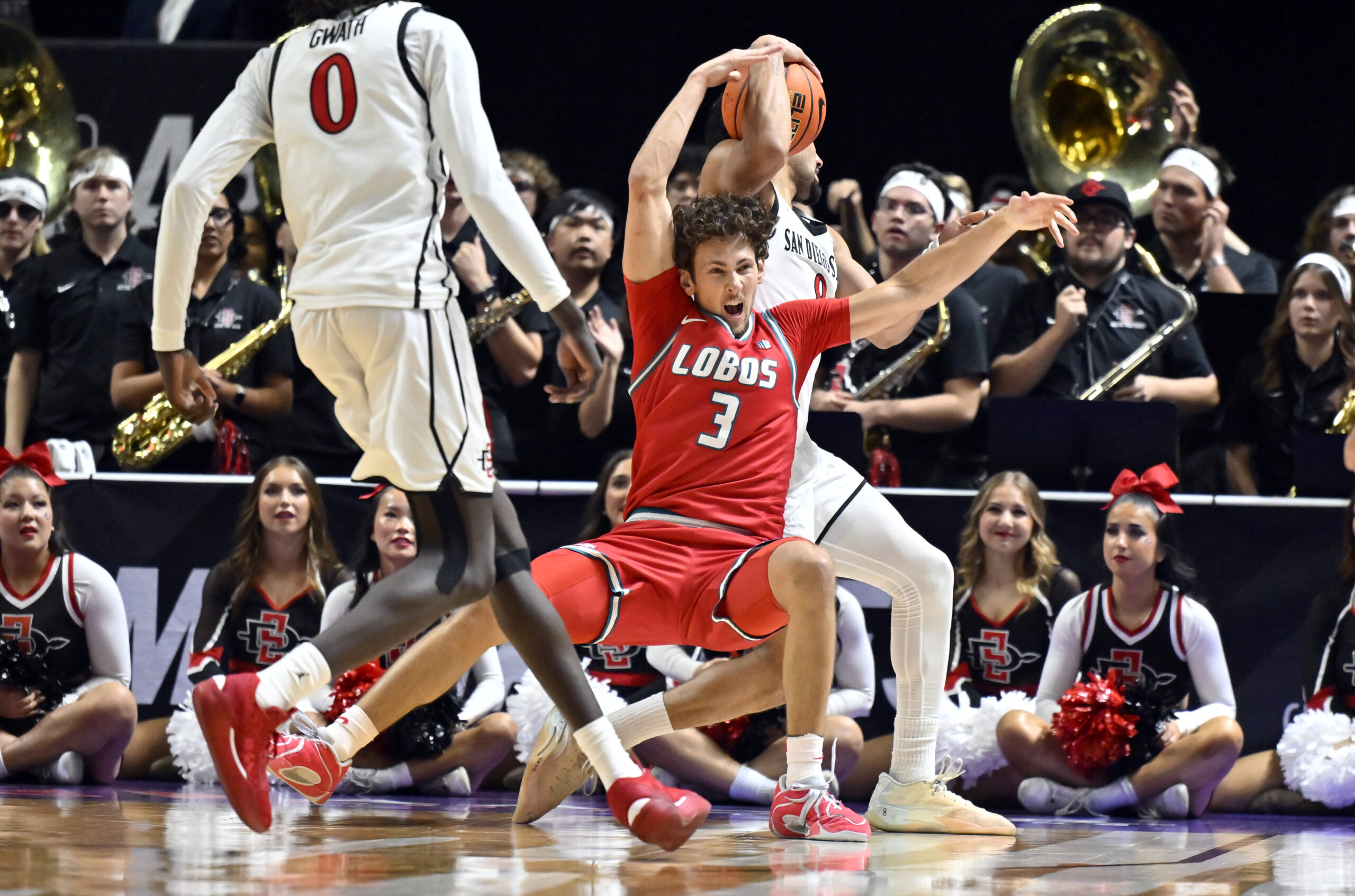 SAN DIEGO STATE REACHES CONFERENCE FINALS ON LAST SECOND LAYUP BY BJ DAVIS. AZTECS WIN 64-62, FACE UTAH STATE THIS AFTERNOON