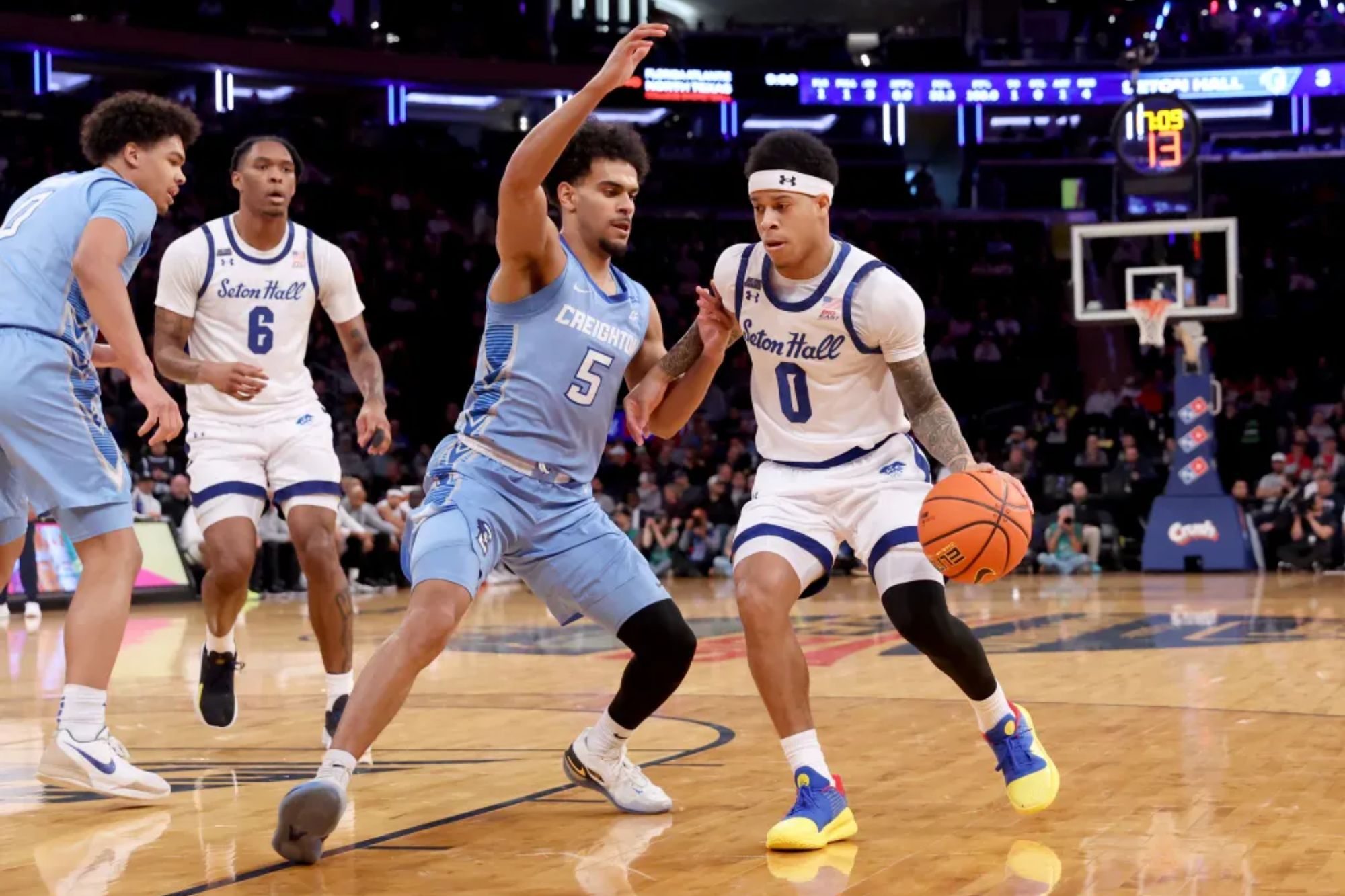 An image collage containing 1 images, Image 1 shows Adam Clark, who scored 16 points, drives on Nik Graves during Seton Hall's 72-61 win over Creighton in a Big East quarterfinal game on March 12, 2026 at the Garden