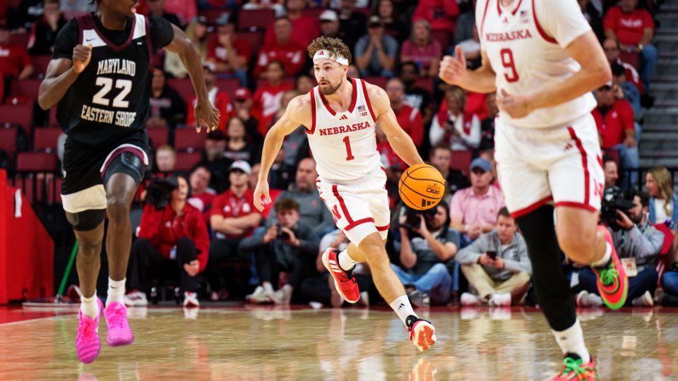 Nebraska Cornhuskers guard Sam Hoiberg (1) with the ball against Maryland Eastern Shore Hawks forward Maurice Vassel (22) during the first half at Pinnacle Bank Arena on November 11, 2025. - Dylan Widger/Imagn Images/Reuters Connect