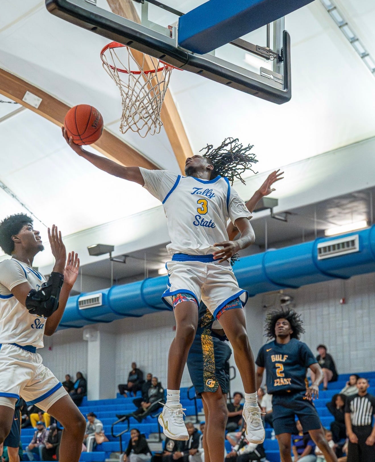 Tallahassee State Eagles guard Shane Cherry (3) makes an impressive layup during an NJCAA Panhandle Conference men's basketball game versus the Gulf Coast State Commodores at the Bill Hebrock Eagledome in Tallahassee, Florida, Saturday, Jan. 17, 2026.