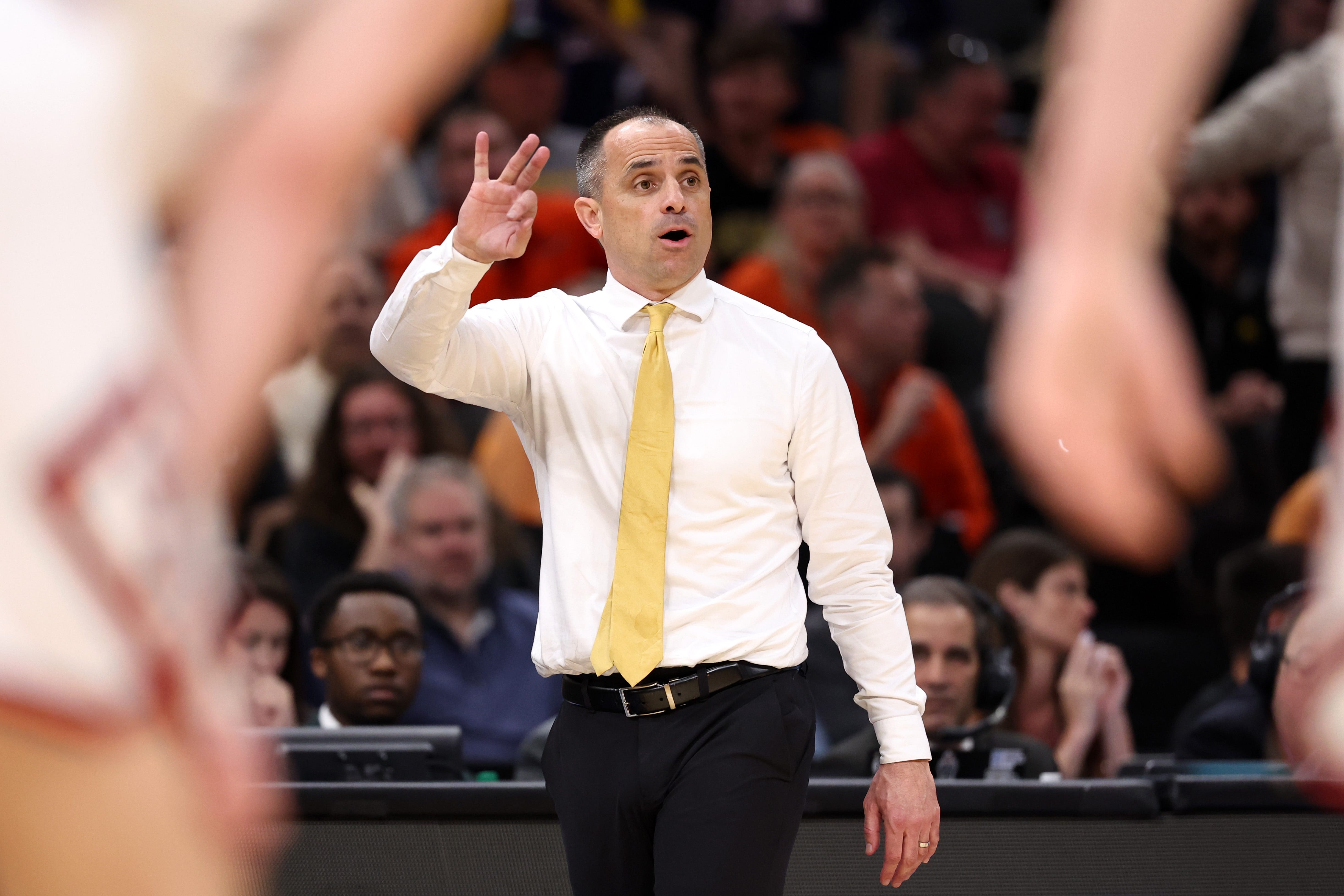 Mar 28, 2026; Houston, TX, USA; Iowa Hawkeyes head coach Ben McCollum looks on in the second half against the Illinois Fighting Illini during an Elite Eight game of the South Regional of the men's 2026 NCAA Tournament at Toyota Center. Mandatory Credit: Troy Taormina-Imagn Images