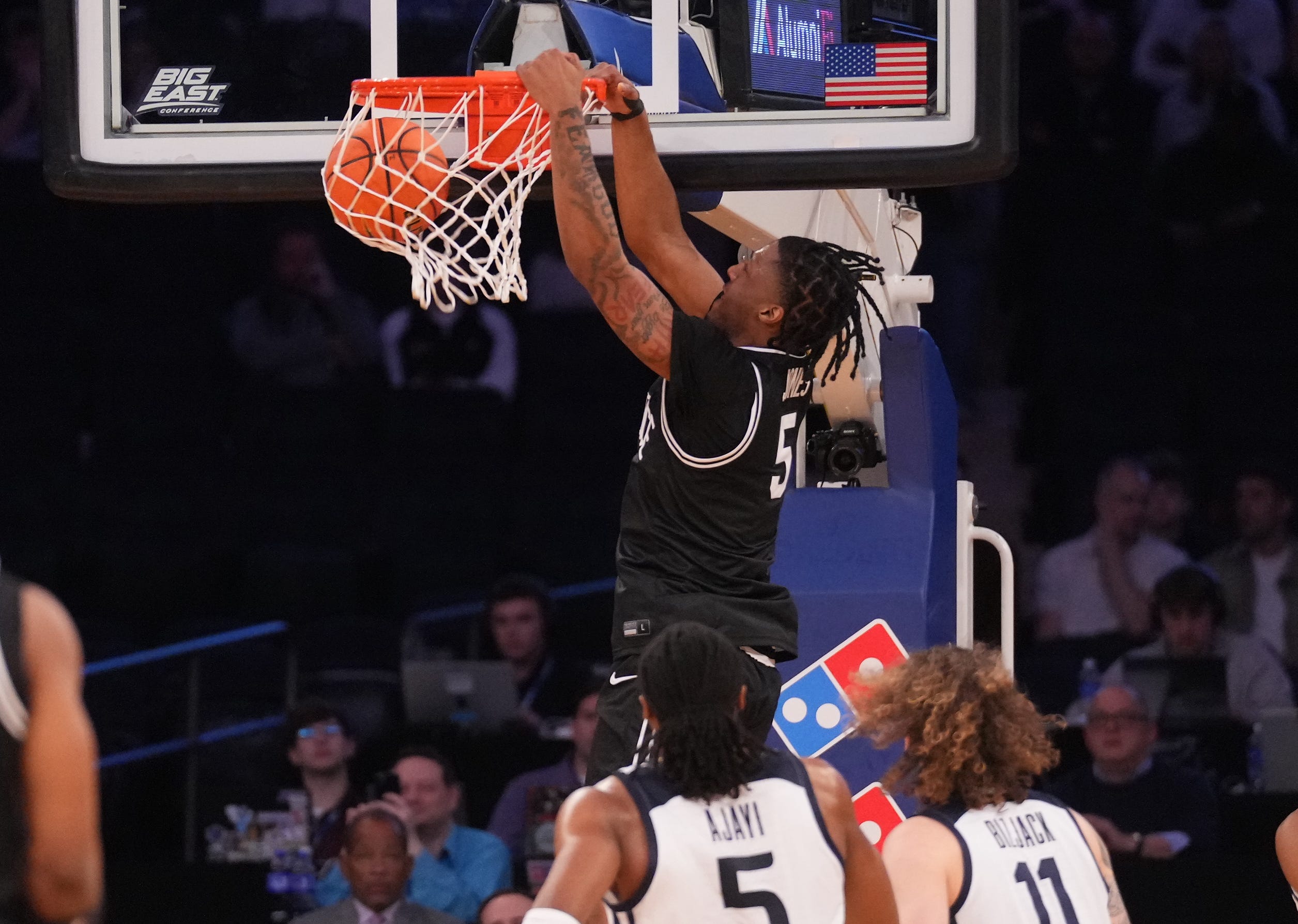 Providence forward Jamier Jones dunks the ball against Butler during the first half of the opening game of the Big East Tournament on Wednesday at Madison Square Garden in New York.