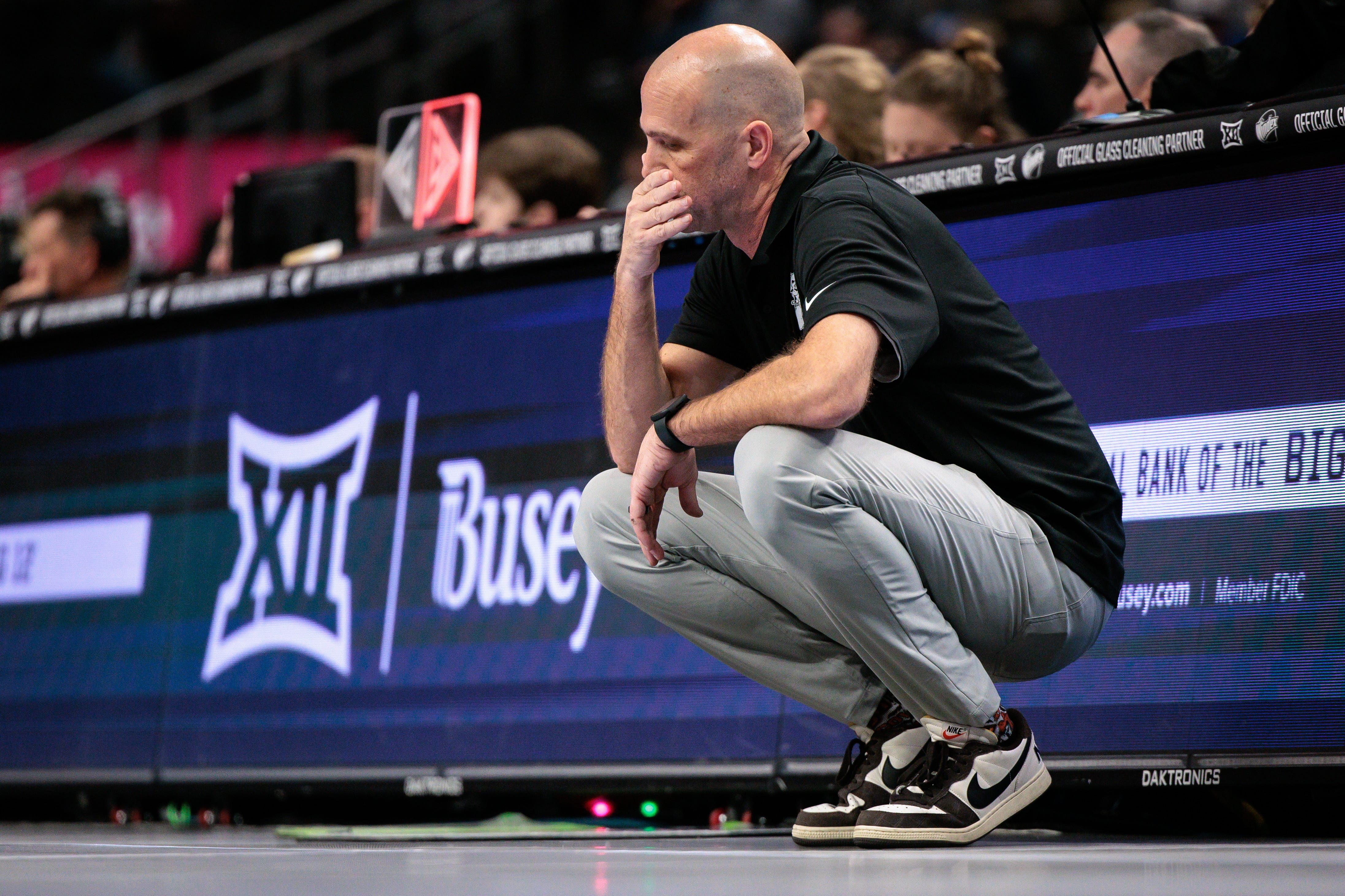 Mar 11, 2026; Kansas City, MO, USA; Oklahoma State Cowboys coach Steve Lutz reacts to game play during the second half against the TCU Horned Frogs at T-Mobile Center. Mandatory Credit: William Purnell-Imagn Images