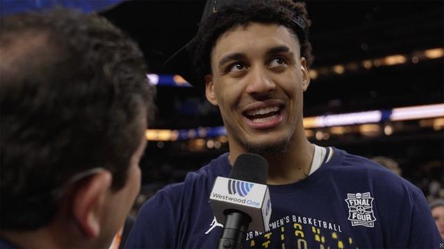 Andy Katz talks with Yaxel Lendeborg after Michigan's National Championship Win