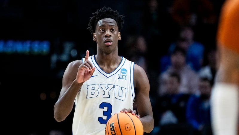 BYU forward AJ Dybantsa (3) gestures to his teammates as he brings the ball up the court during a first-round college basketball game against Texas in the NCAA Tournament held at the Moda Center in Portland, Ore., on Thursday, March 19, 2026.