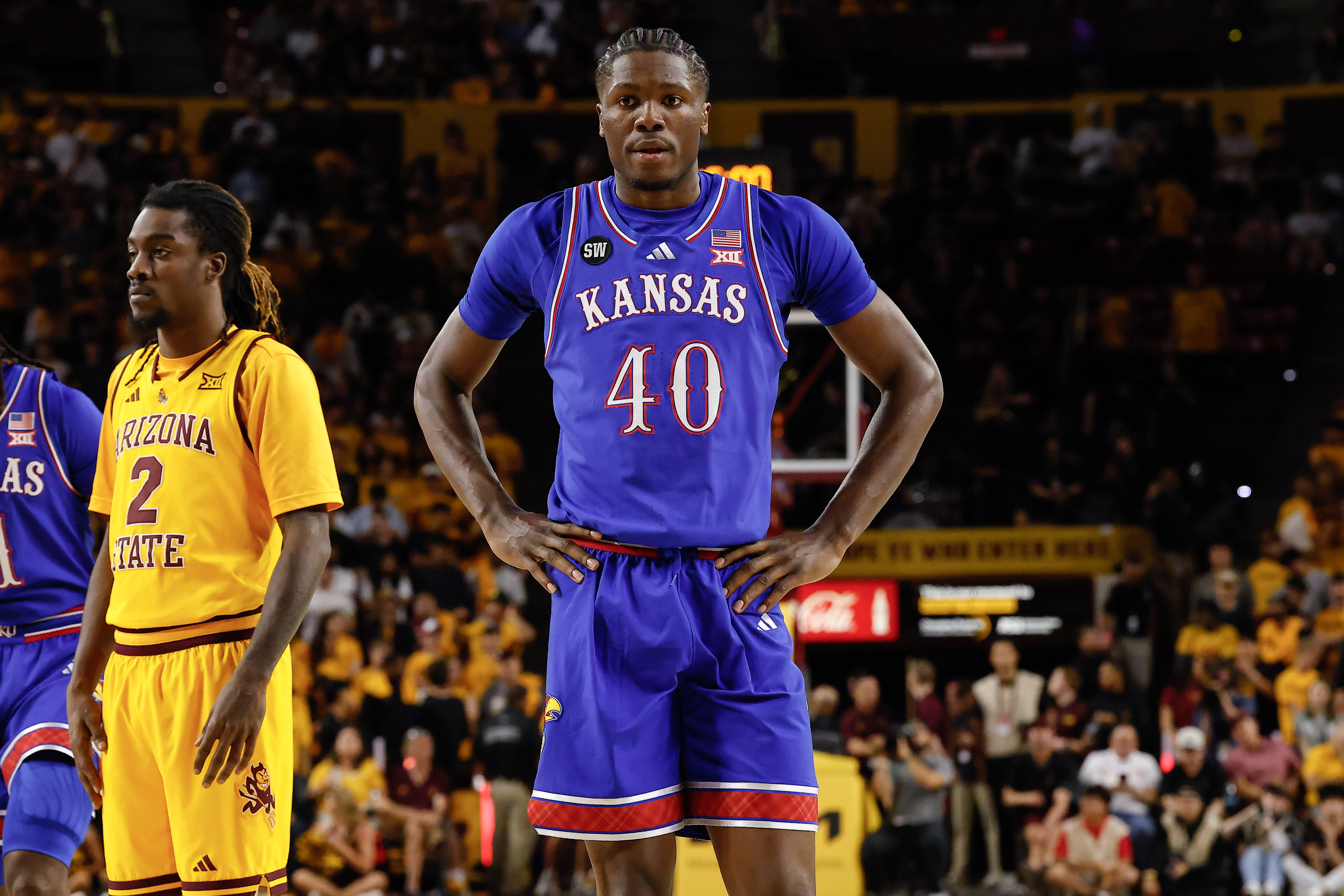 TEMPE, AZ - MARCH 3: Kansas Jayhawks forward Flory Bidunga (40) looks on during the college basketball game between the Kansas Jayhawks and the Arizona State Sun Devils on March 3, 2026 at Desert Financial Arena in Tempe, Arizona. (Photo by Kevin Abele/Icon Sportswire via Getty Images)