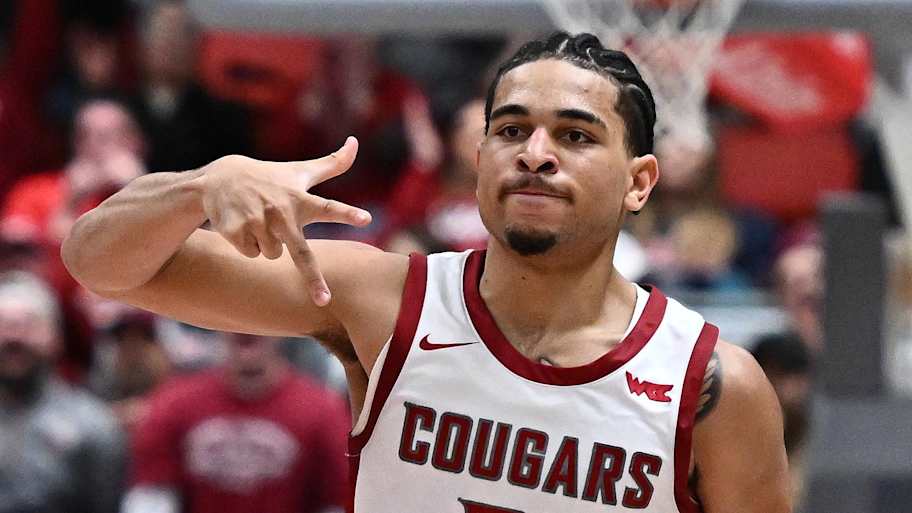 Jan 15, 2026; Pullman, Washington, USA; Washington State Cougars guard Ace Glass Lll (21) celebrates a three-pointer against 