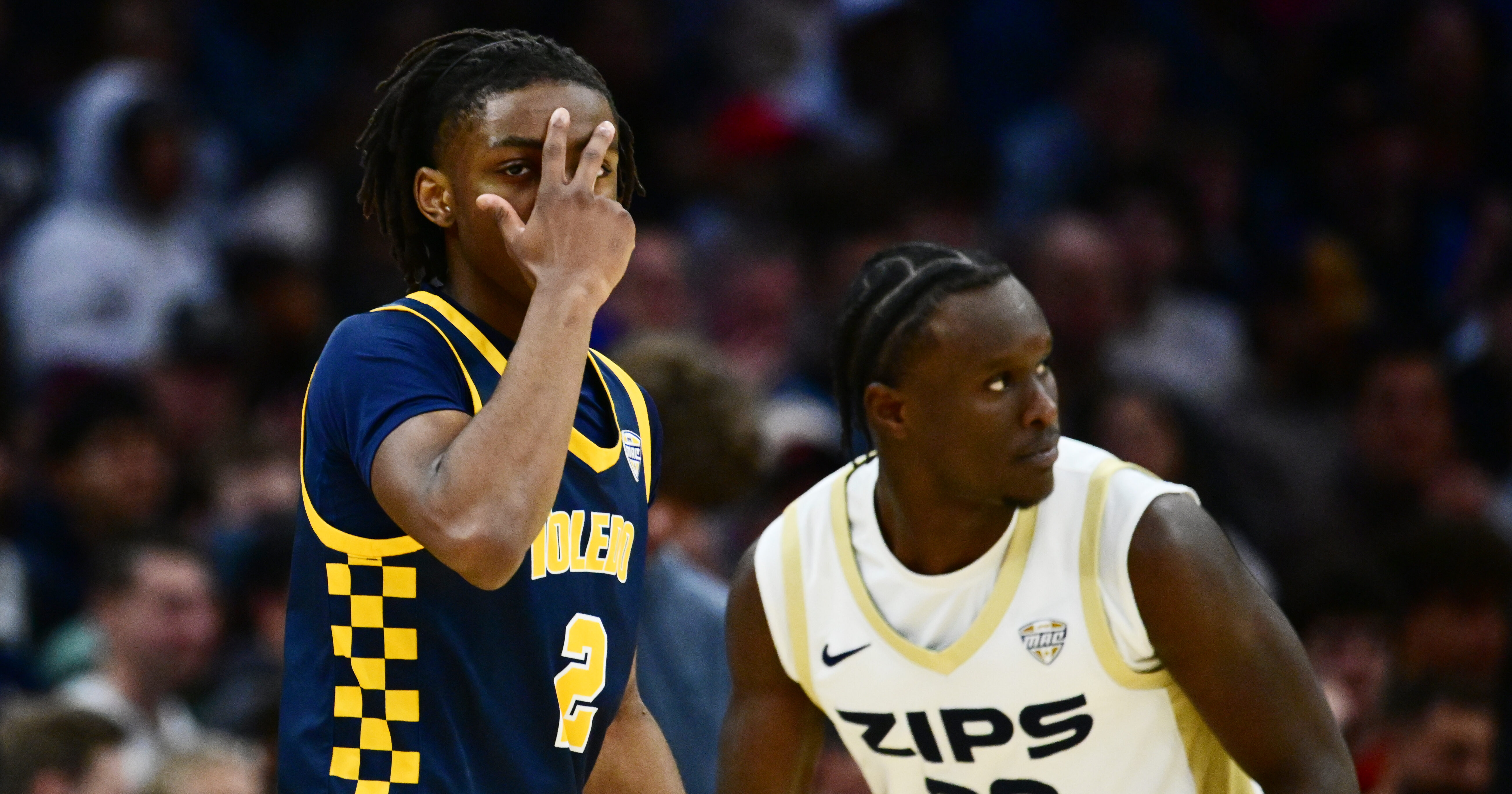 Mar 14, 2026; Cleveland, OH, USA; Toledo Rockets guard Leroy Blyden Jr. (2) celebrates after hitting a three point basket against the Akron Zips during the first half of the men’s Mid-American Conference Championship at Rocket Arena. Mandatory Credit: Ken Blaze-Imagn Images