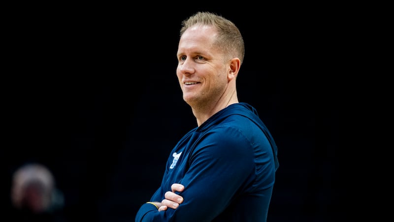 BYU head coach Kevin Young watches his players warm up during a practice the day before a first-round college basketball game against Texas in the NCAA Tournament held at the Moda Center in Portland, Oregon, on Wednesday, March 18, 2026.