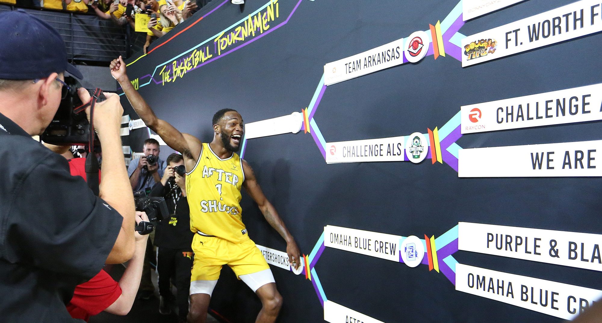 AfterShocks' Markis McDuffie (1) celebrates moving their name tag to the semifinal bracket on The Basketball Tournament