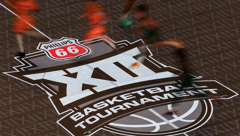 Players run the floor during the 2026 Phillips 66 Big 12 Men's Basketball Tournament at the T-Mobile Center in Kansas City, Mo., on Tuesday, March 10, 2026.