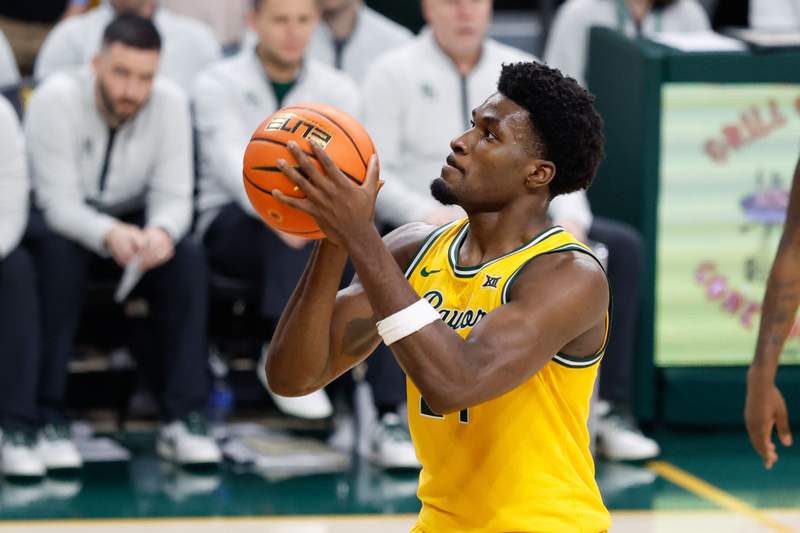 Mar 7, 2026; Waco, Texas, USA; Baylor Bears guard Tounde Yessoufou (24) shoots a free throw during the second half at Paul and Alejandra Foster Pavilion. © Chris Jones-Imagn Images