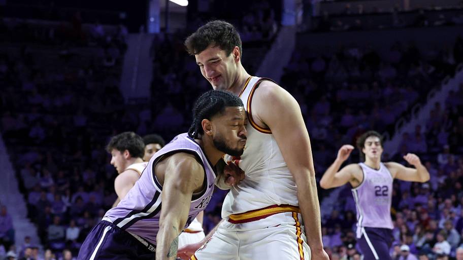 Iowa State Cyclones forward Milan Momcilovic (22) guards Kansas State Wildcats guard David Castillo.