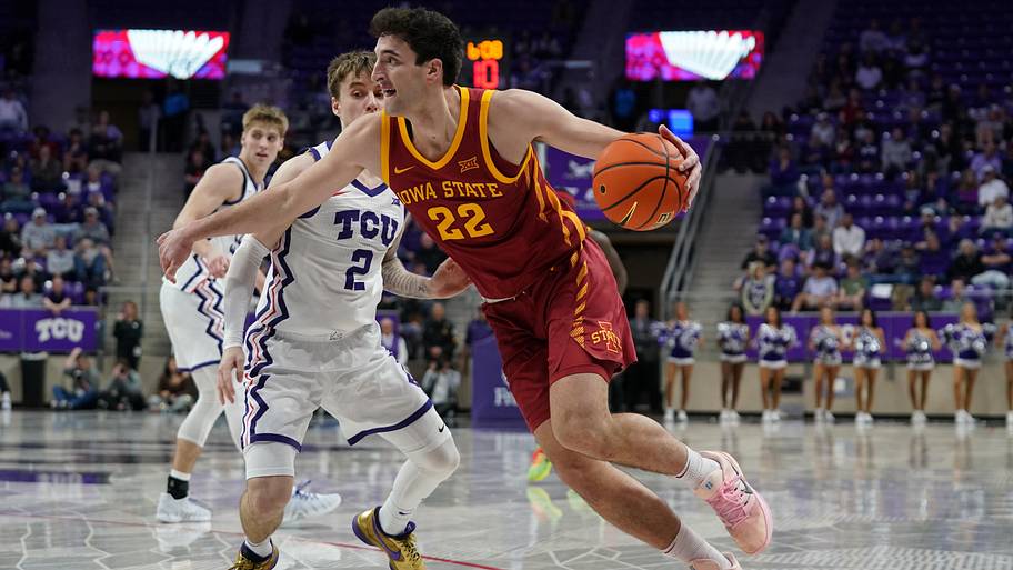 Iowa State Cyclones forward Milan Momcilovic (22) drives on TCU Horned Frogs guard Brock Harding.
