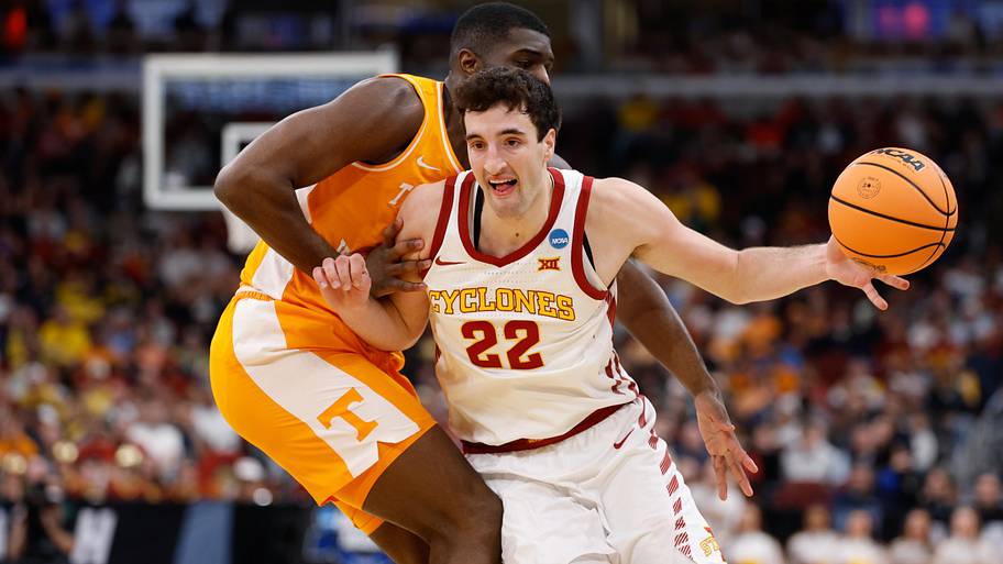 Iowa State Cyclones forward Milan Momcilovic (22) drives the ball against Tennessee Volunteers forward Jaylen Carey.