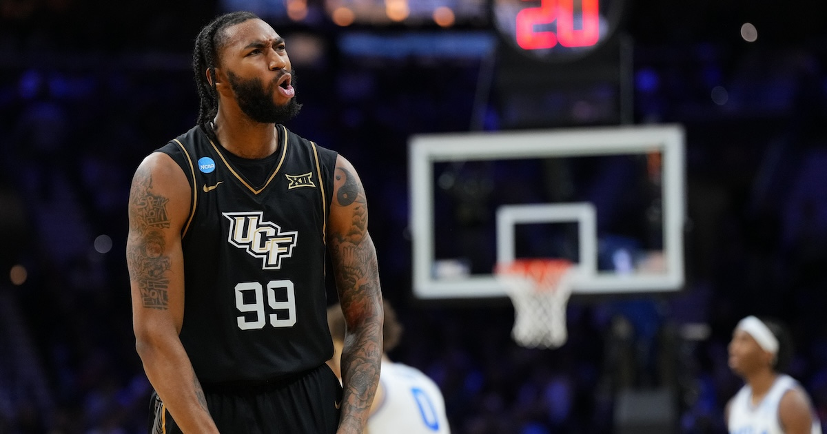 Mar 20, 2026; Philadelphia, PA, USA; UCF Knights forward Jordan Burks (99) reacts against the UCLA Bruins in the second half during a first round game of the men's 2026 NCAA Tournament at Xfinity Mobile Arena. Mandatory Credit: Kyle Ross-Imagn Images