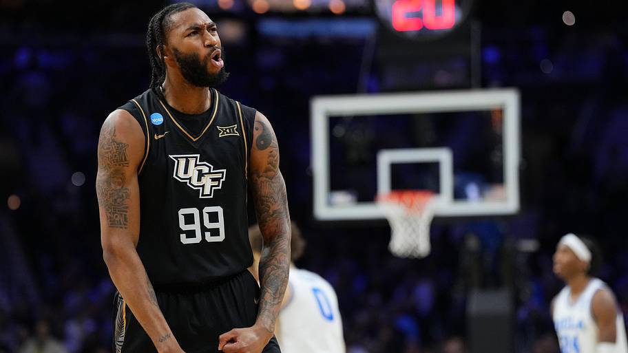 UCF Knights forward Jordan Burks reacts to a call during a basketball game. 