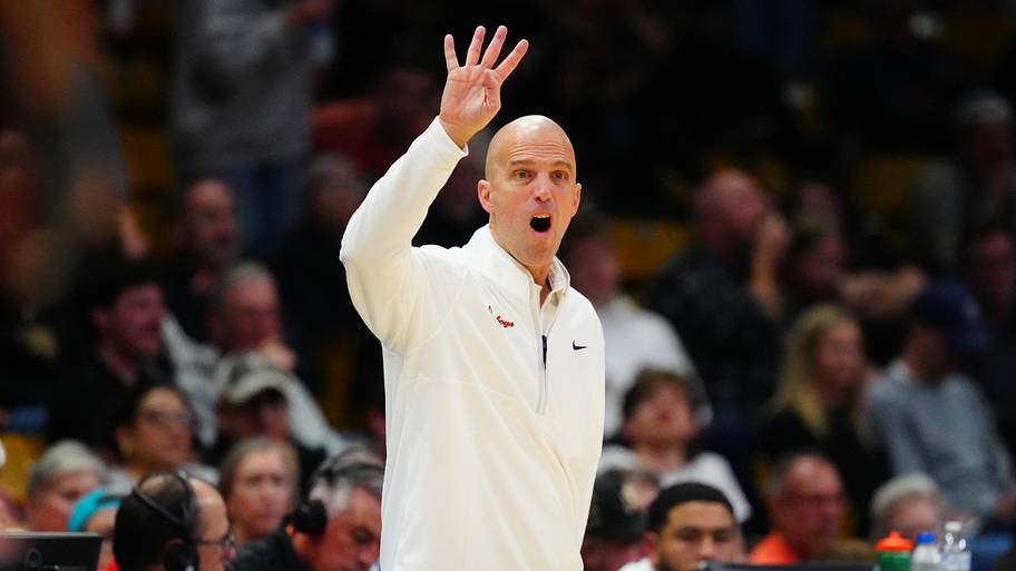 Oklahoma State Cowboys head coach Steve Lutz calls out a play. 