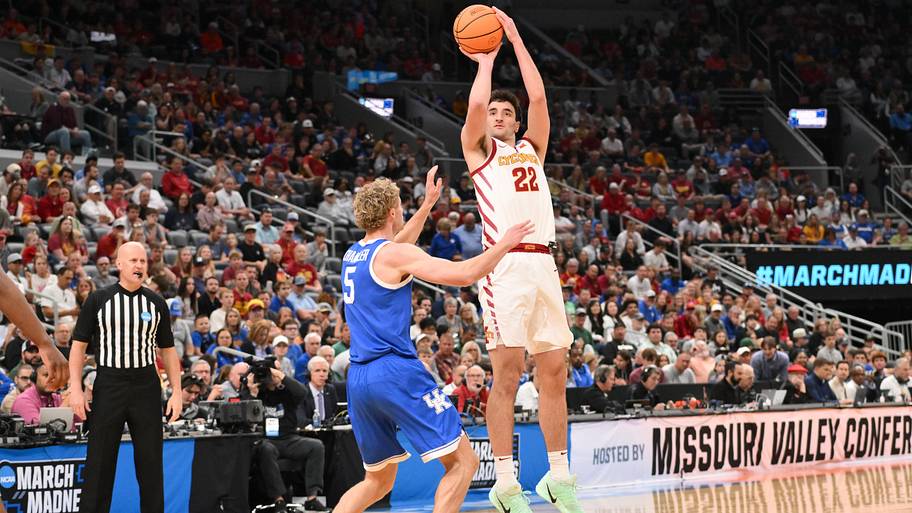 Iowa State Cyclones forward Milan Momcilovic (22) shoots as Kentucky Wildcats guard Collin Chandler (5) defends.