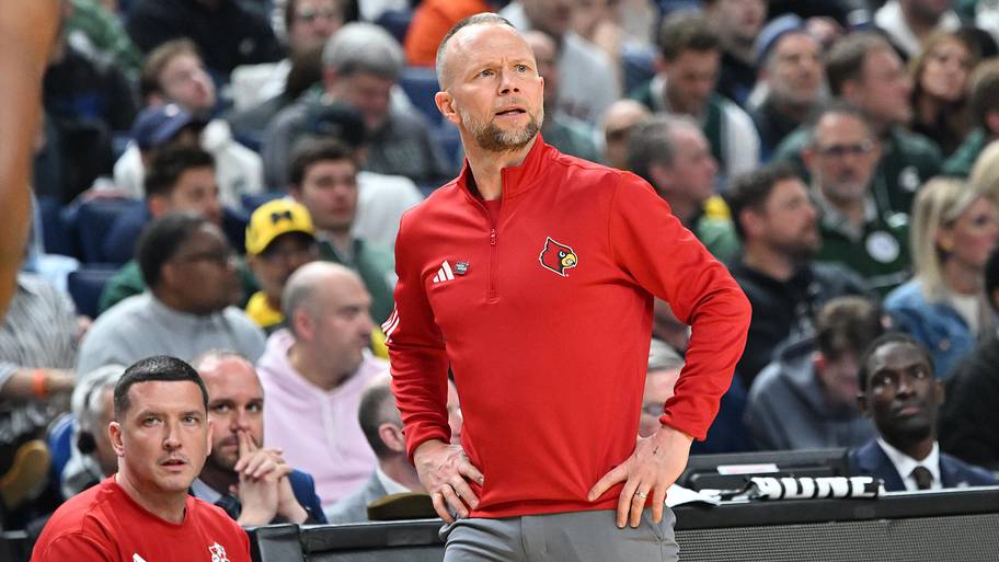 Mar 21, 2026; Buffalo, NY, USA; Louisville Cardinals head coach Pat Kelsey looks on during the first half against the Michiga