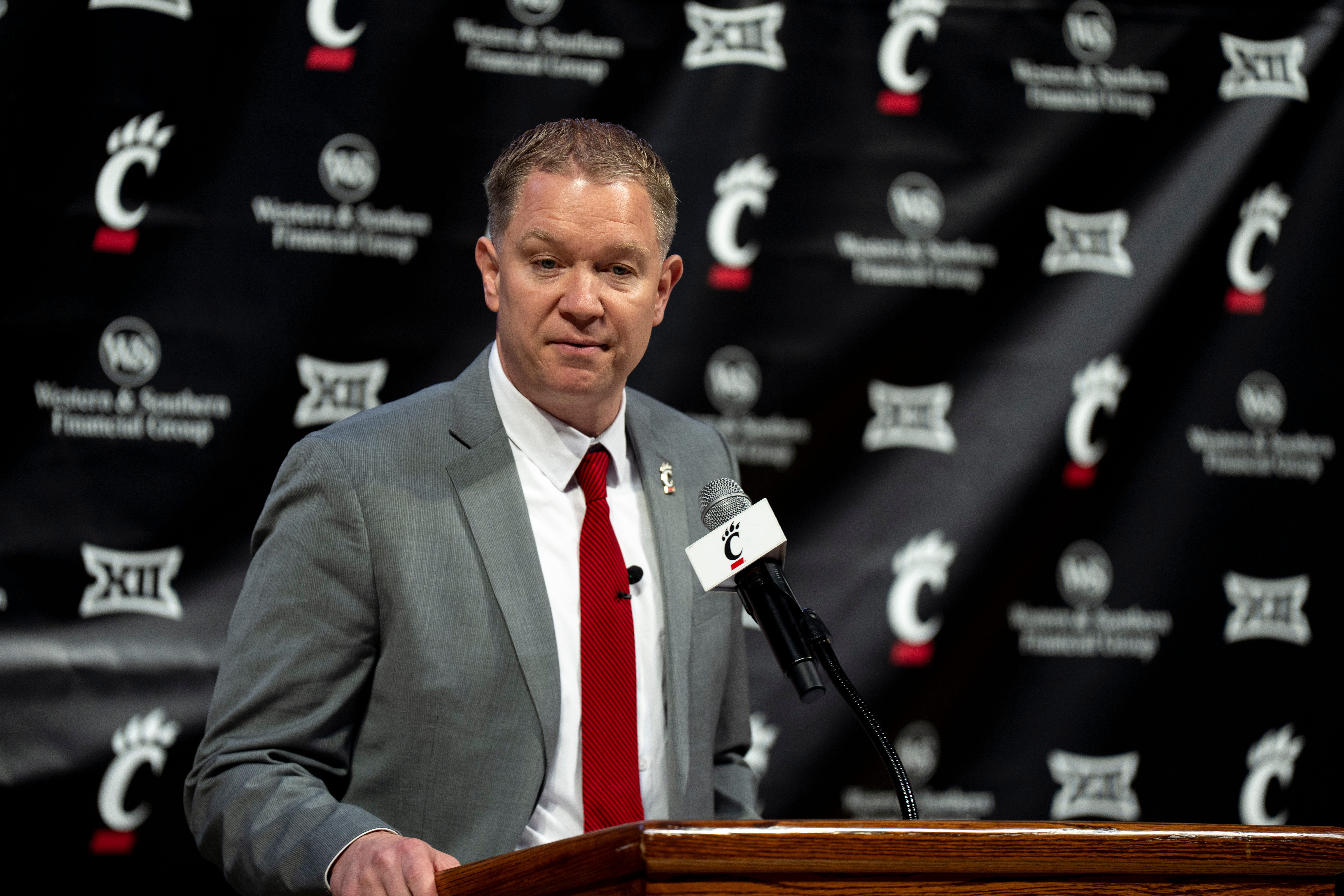 Cincinnati Bearcats head coach Jerrod Calhoun speaks during a press conference announcing him as the head men's basketball coach at Fifth Third Arena in Cincinnati on Wednesday, March 25.