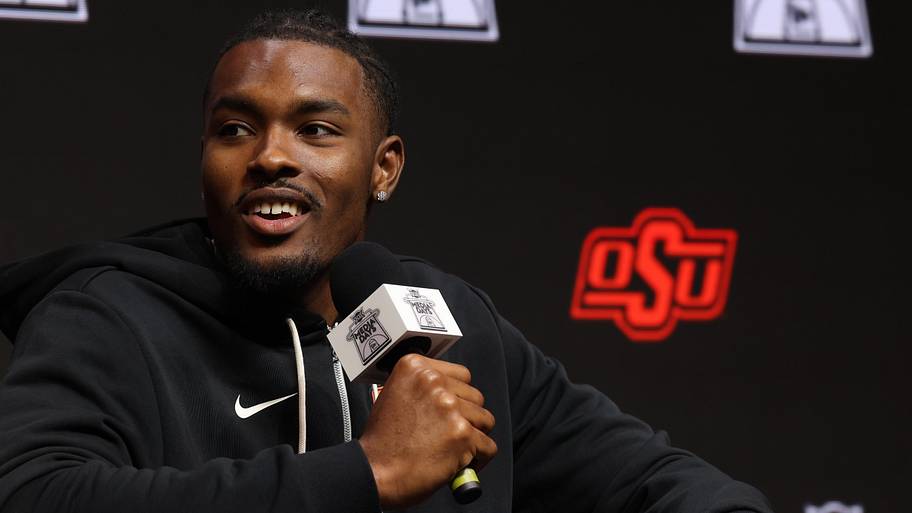 Oklahoma State basketball player Robert Jennings II speaks to media during Big 12 Men's Basketball media day.