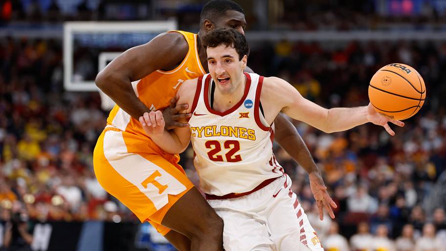 Iowa State Cyclones forward Milan Momcilovic (22) drives the ball against Tennessee Volunteers forward Jaylen Carey.