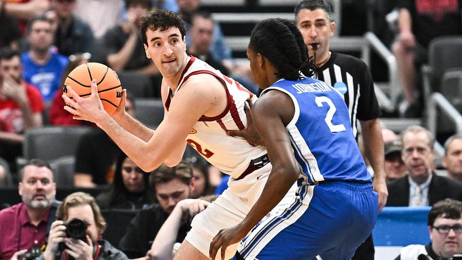 Iowa State Cyclones forward Milan Momcilovic (22) looks to pass as Kentucky Wildcats guard Jasper Johnson (2) defends.