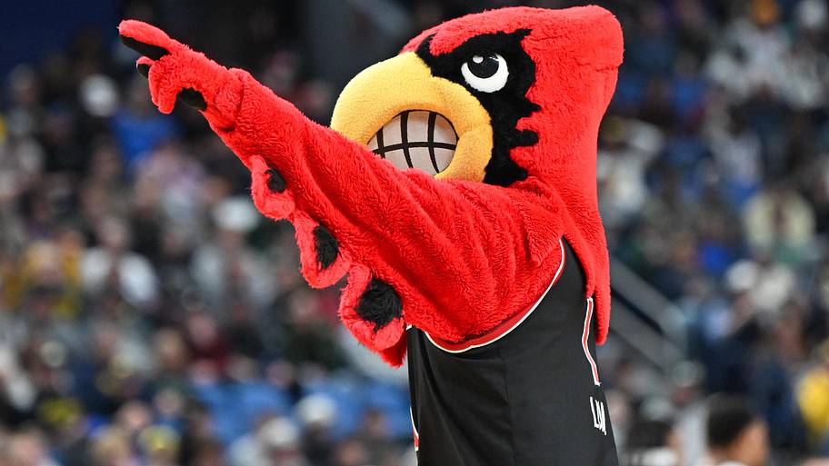 Louisville Cardinals mascot Louie looks on during the first half against the Michigan State Spartans.