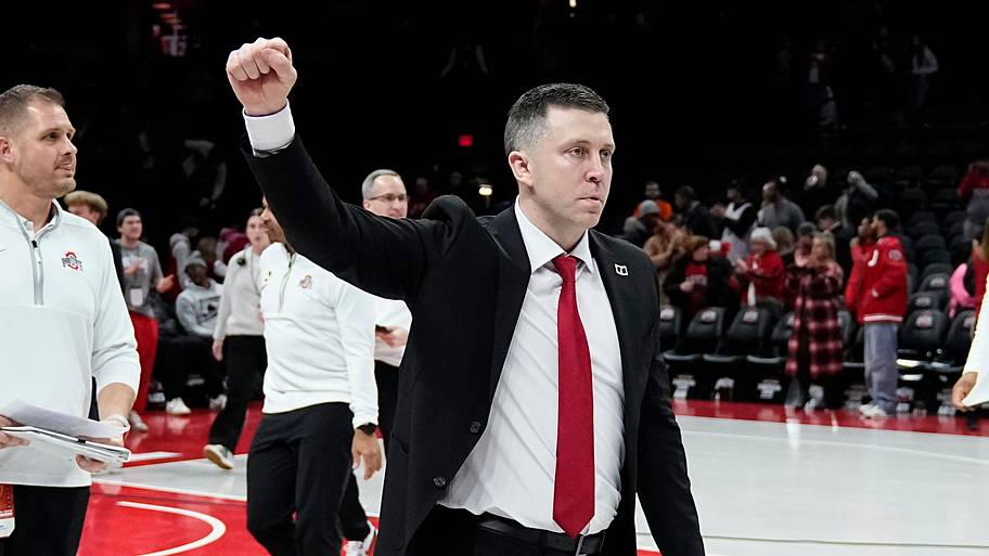 Ohio State Buckeyes head coach Jake Diebler celebrates following the 89-82 win over USC Trojans in the NCAA men's basketball